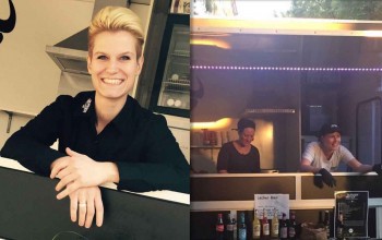 Strahlend lachende Frau und Burger aus Foodtruck Köln herausgebend